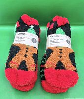 Front view of two packaged bundles of George fuzzy socks