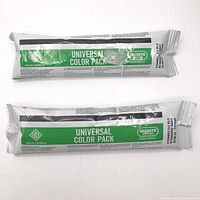 Front view of two sealed Euclid Chemical Universal Color Pack tubes