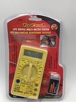 Front view of blister package showing ToolDeal DT-830B digital multimeter, battery, and leads