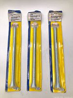 Three packaged BrassCraft bending springs front view