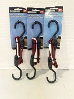 Three packaged Stinson flat stretch cords front view