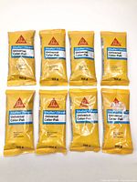 All eight sealed Sika Universal Color-Pak pouches front view