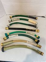 All eight 12 in. hose pieces laid out showing both ends