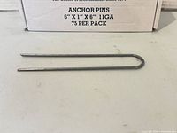 single 6-inch U-shaped anchor pin with box label visible