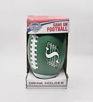 Front of boxed football-shaped drink holder showing Roughriders logo and branding