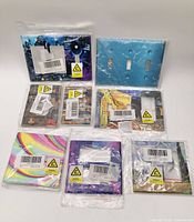 All seven packaged wall plates displayed front view