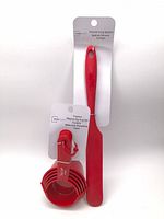 Measuring cup set and spatula packaged together front view