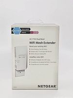 Front view of boxed NETGEAR AC1750 WiFi Mesh Extender