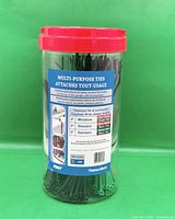 Full jar front showing cable ties and lid