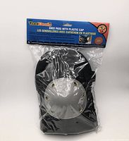 Front view of sealed package showing one knee pad with gray cap