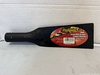 Overall view of ProYard scraper showing blade and handle stub