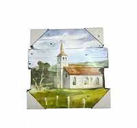 Front view showing church scene on wood panel