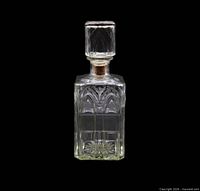 Full front view of decanter with stopper inserted