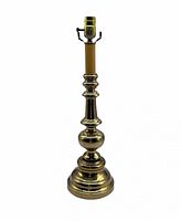 Full view of brass table lamp without shade