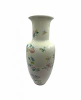 Full view of vase front showing shape and floral design