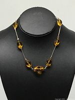 Full view of necklace on display bust