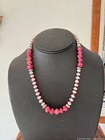 Full necklace on display bust showing bead pattern