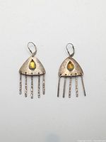 Front view of both sterling silver dangle earrings showing yellow stones and bar drops