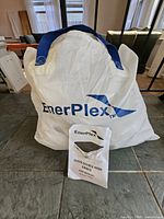 EnerPlex branded storage bag with manual in front