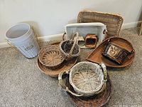 Group of assorted baskets and containers