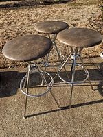 Three stools top and side view outdoors