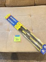 Front view of both sealed Michelin Guardian wiper blade packages, 20" and 22"