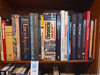 Shelf view showing all book spines and titles