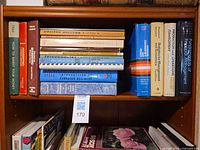 Upper shelf showing finance, statistics and operations titles