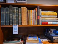Shelf with entire lot of French books, top and lower rows