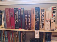 Whole shelf segment showing all titles