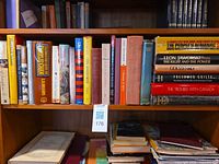 Shelf showing full assortment of books and pamphlets