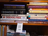 Overall view of two shelves showing the health and wellness book spines.