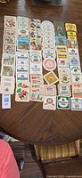 Full layout of roughly 55 German beer coasters on table