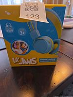 Front of sealed Lil' Jams headphone box showing product image and key specs