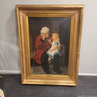 Full view of framed painting leaning against wall