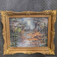 Front view of signed framed oil landscape painting