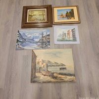 All five artworks laid out for scale and identification