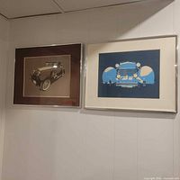 Overall view of both framed lithographs on wall