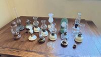 Full group of miniature lamps on table