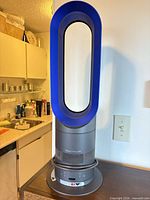 Full view of Dyson Hot+Cool tower fan heater on counter