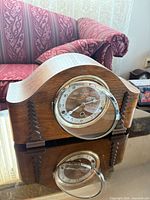 Front view of Forestville tambour mantel clock with open glass bezel