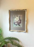 Full view of framed print on wall