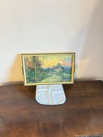 Full view of framed print on table