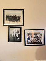Wall view showing all three framed photographs