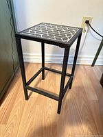 Full view of side table showing frame and top