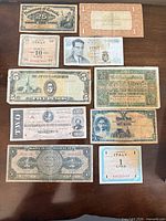 All ten notes laid out front and back