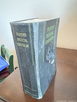 Spine and front cover of Modern Medical Counselor showing wear