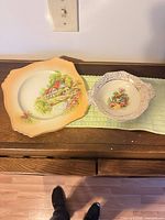 Both plates side by side on surface