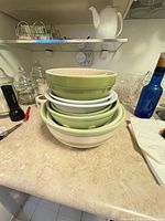 stacked view of all eight nested bowls