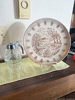 Plate and syrup dispenser on surface